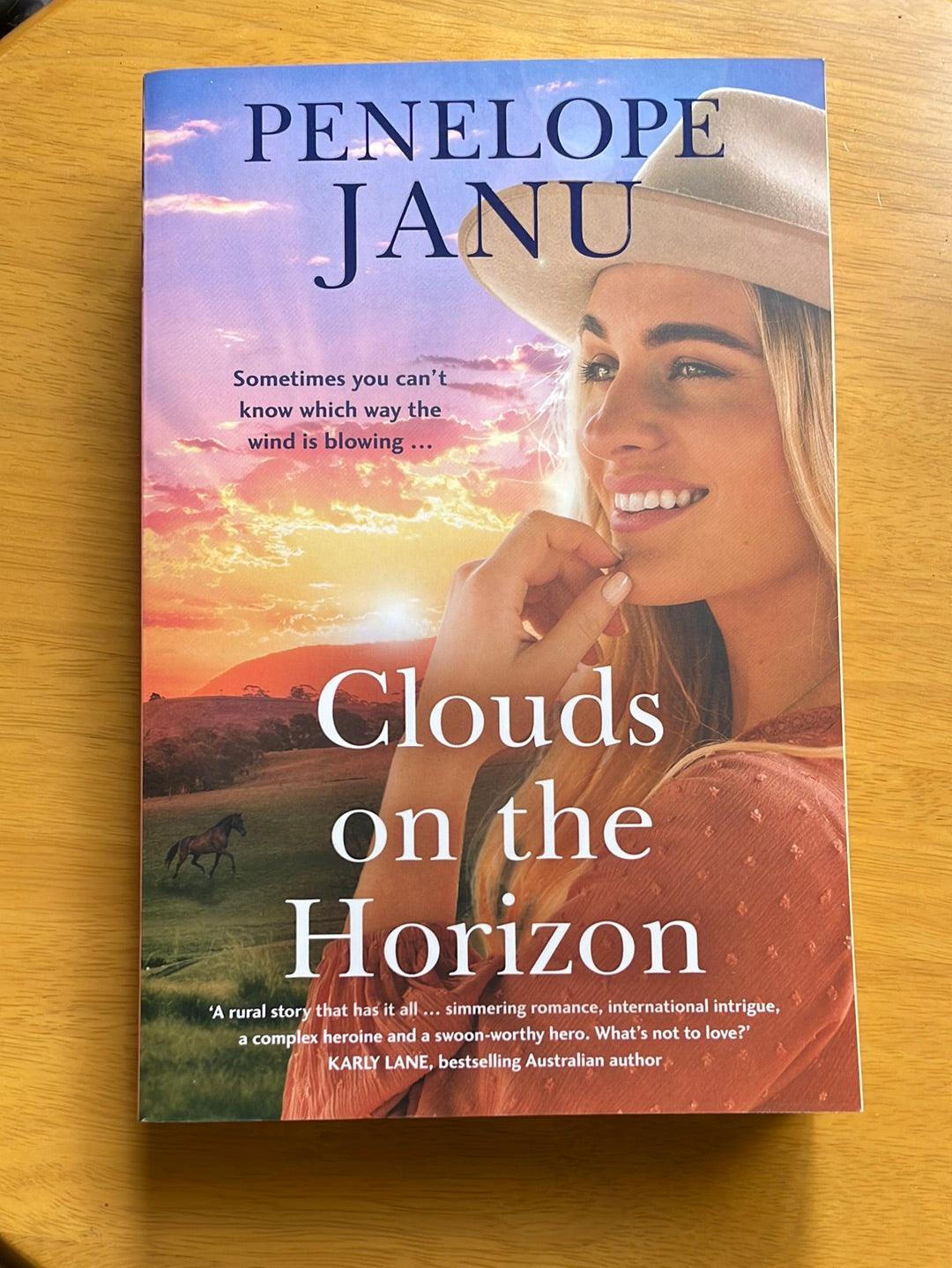 Book: Clouds on the horizon by Penelope Janu - Scroll through thrift