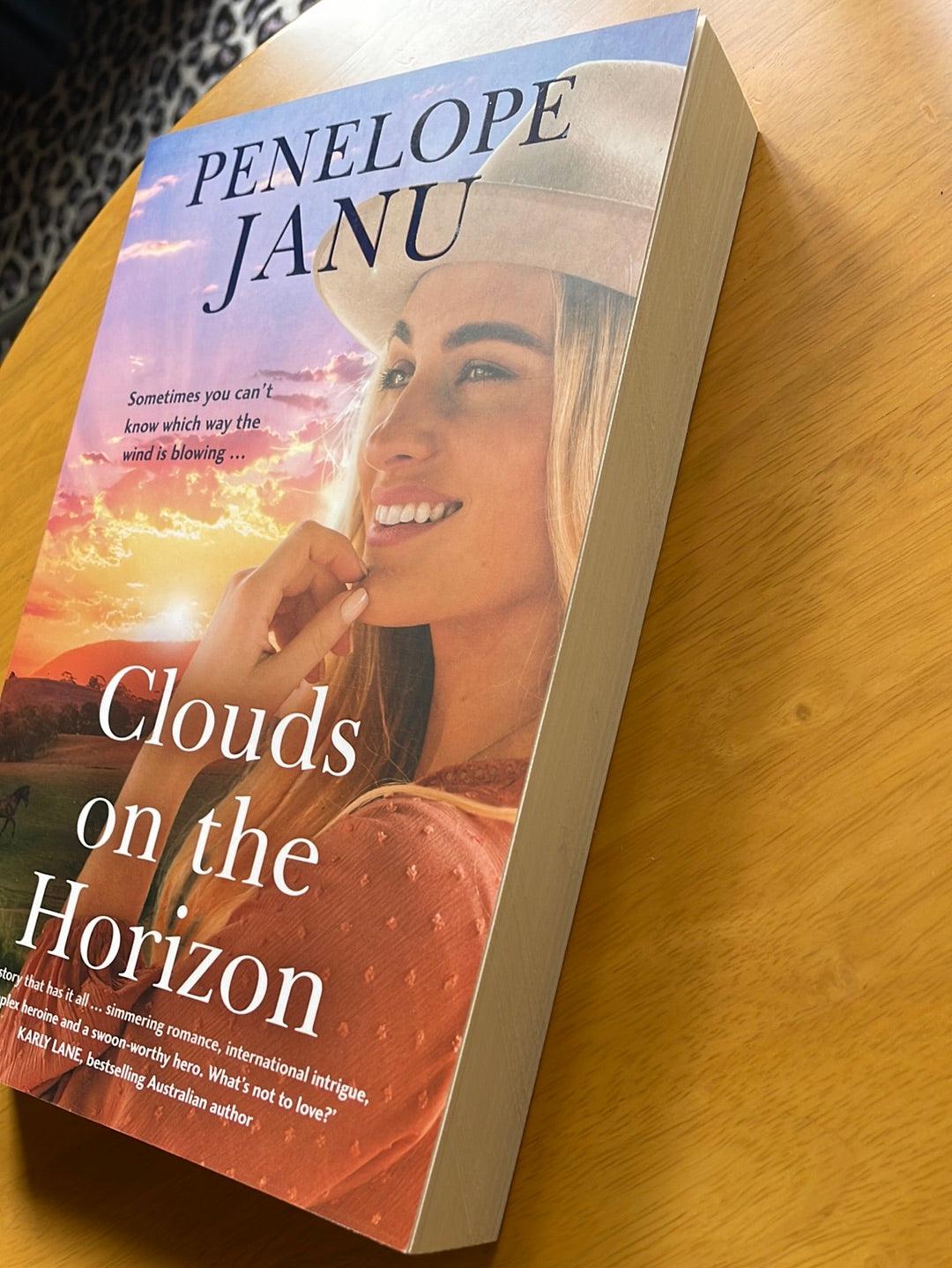 Book: Clouds on the horizon by Penelope Janu - Scroll through thrift