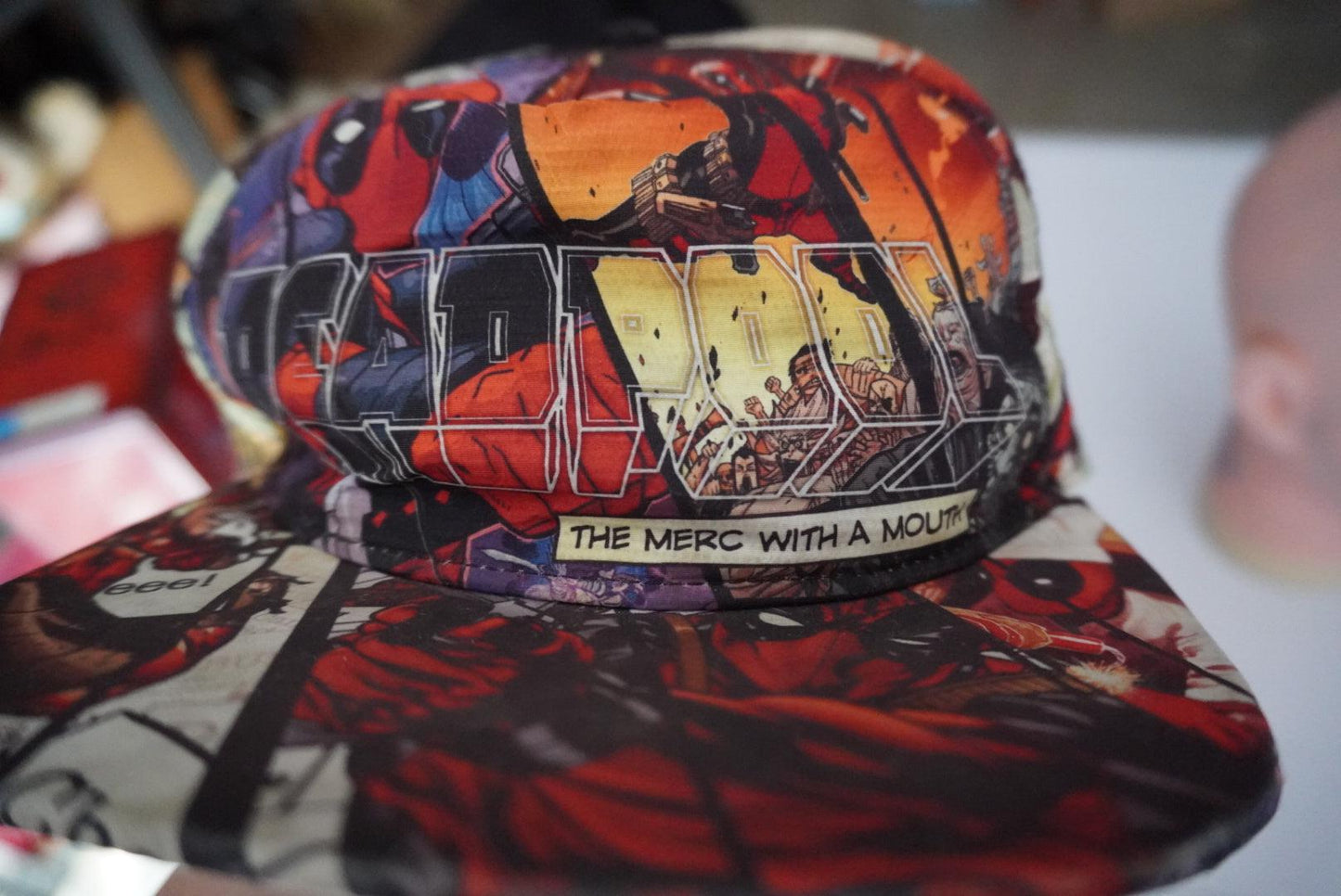 Deadpool comic strip scene hat - Scroll through thrift